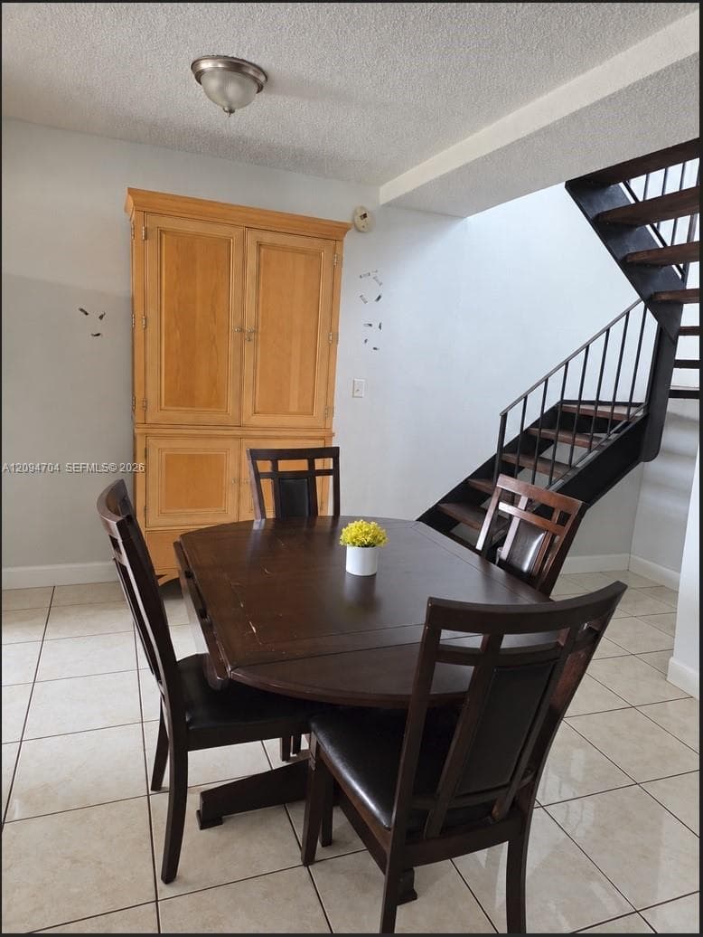Space under staircase and next to it could be enclosed to create storage
