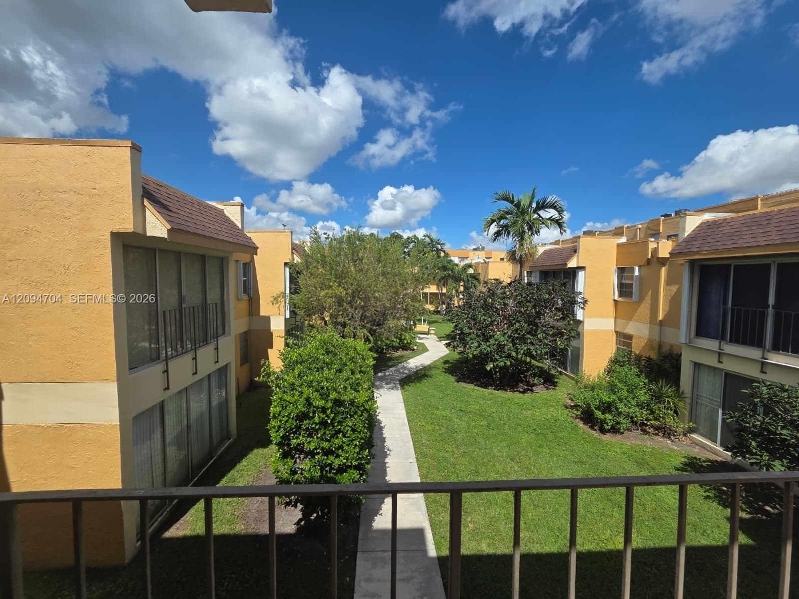 courtyard view from outside front door of unit