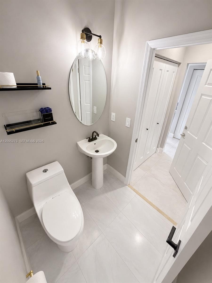 Downstairs, half bathroom