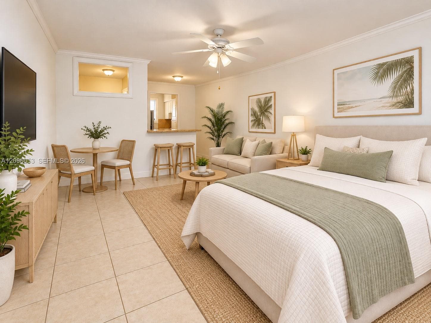 Open-concept interior featuring large-format ceramic tile flooring, a breakfast bar with stone-finish countertop, recessed lighting, and a multi-blade ceiling fan