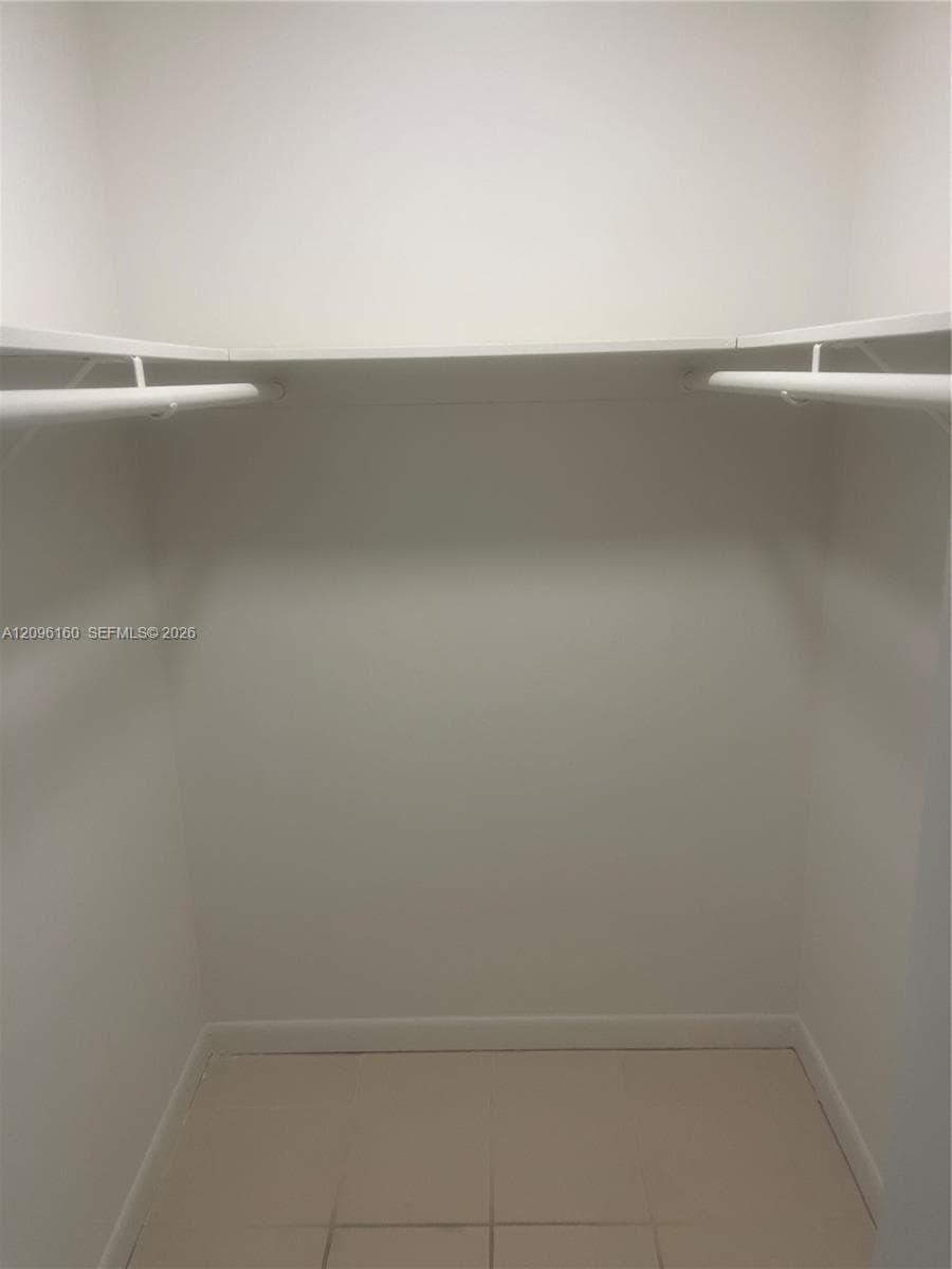Primary Bedroom Walk-in closet