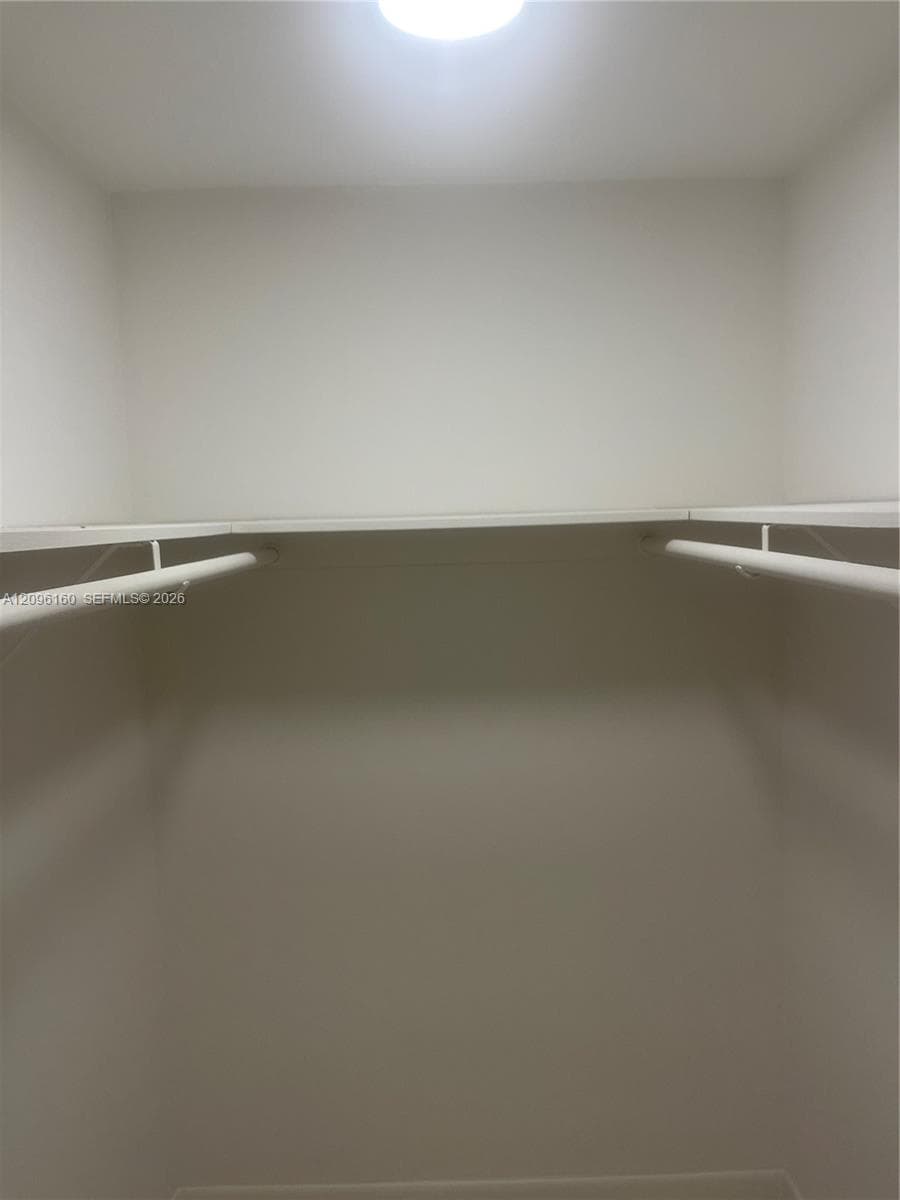 Primary Bedroom Walk in Closet