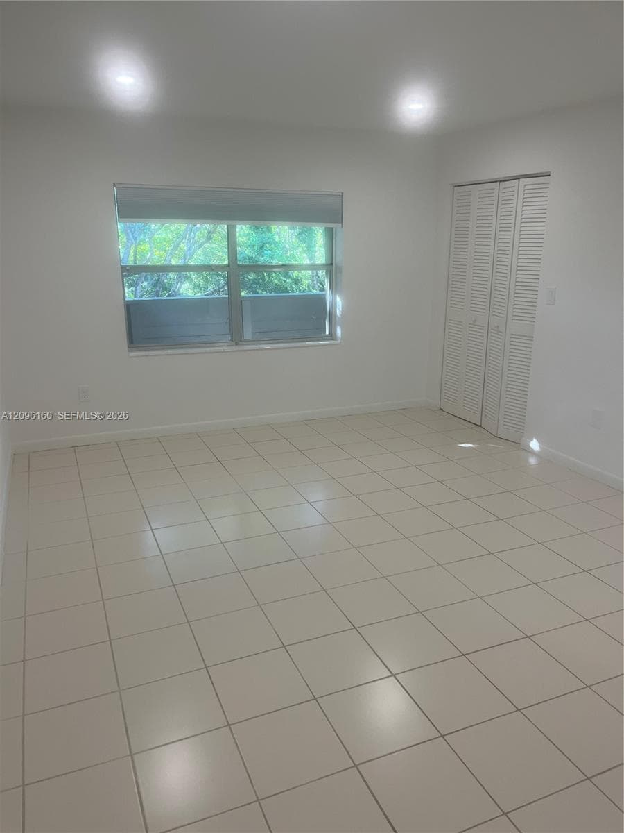Primary bedroom with 3 closedts
