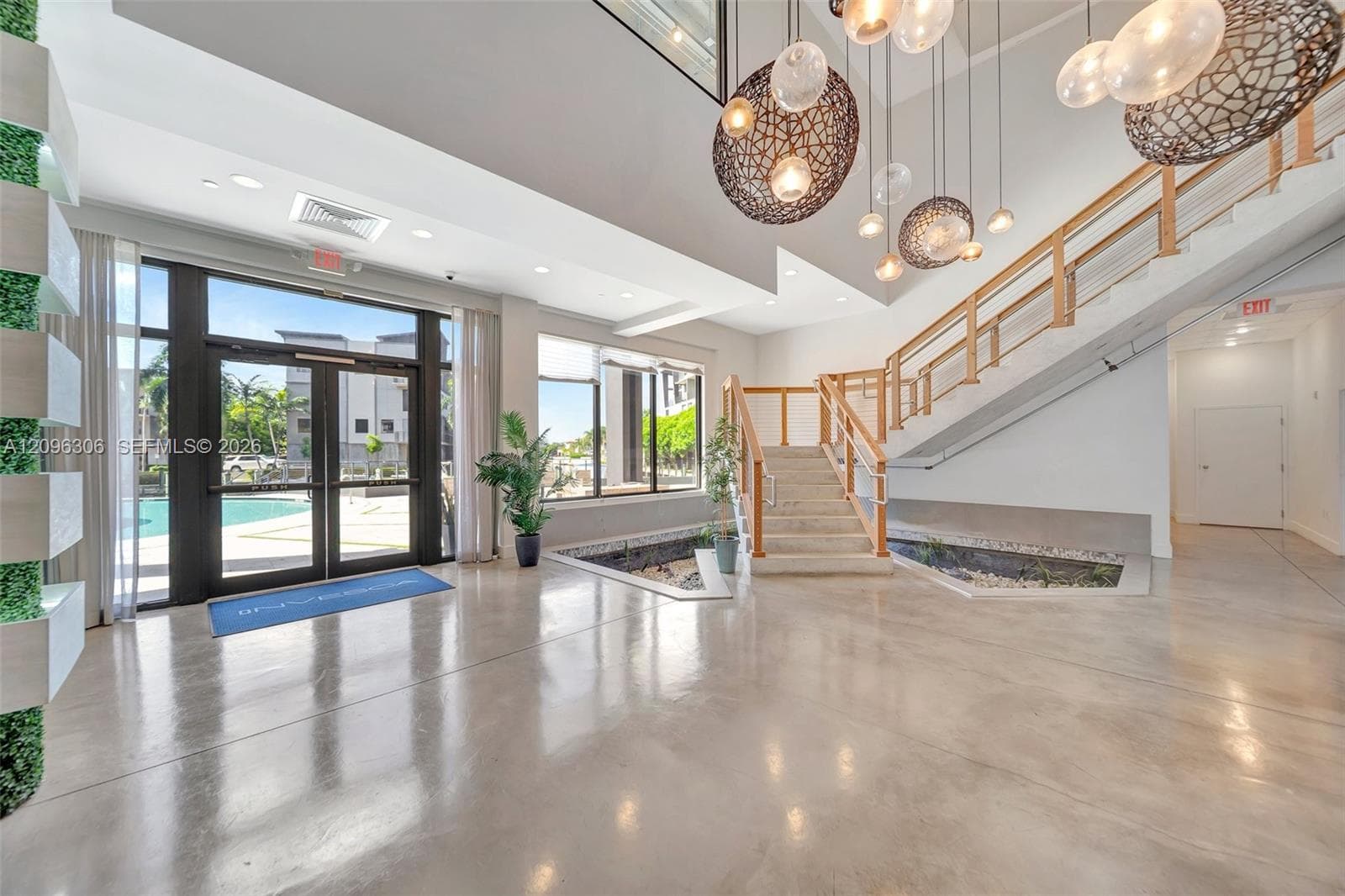 Clubhouse with stairs leading to the 2nd floor gym