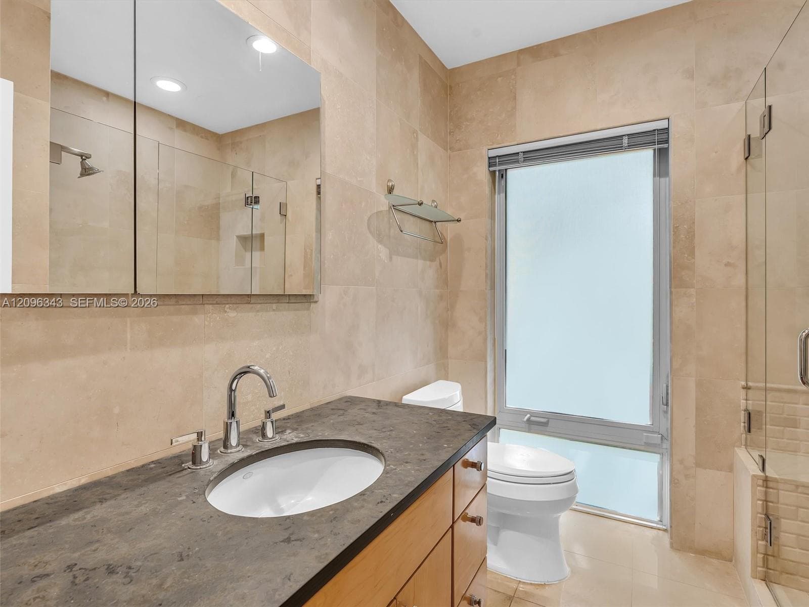Updated bath in home for rent in Coconut Grove in Miami, FL. Enjoy large fenced yard, updated home in the North Grove.  Natoma Manors has 24/7 police patrol. Home for rent by Realtor. https://www.natomamanors.com/