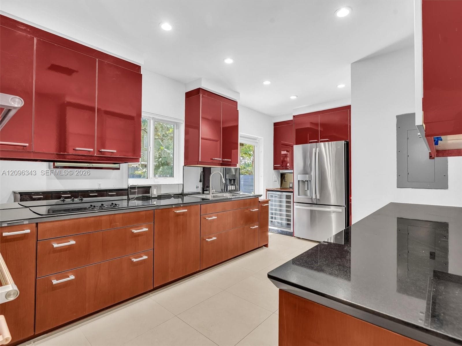 Stylish Poggenpohl kitchen with stainless steel appliances in home for rent in Coconut Grove in Miami, FL. Updated rental in Natoma Manors has 24/7 police patrol. Home for rent by Realtor. https://www.natomamanors.com/