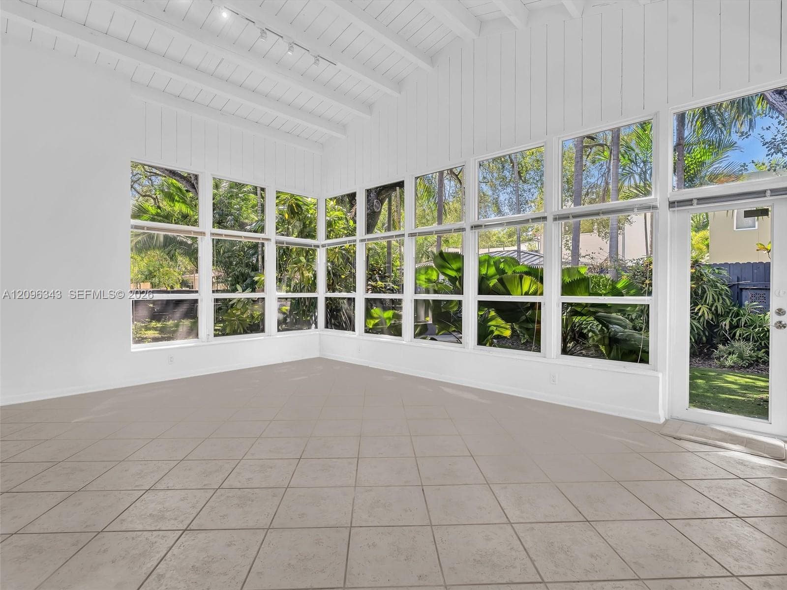 Sunny and private florida room surrounded by nature. Great home for rent in Coconut Grove in Miami, FL. Enjoy large fenced yard, updated home in the North Grove.  Natoma Manors has 24/7 police patrol. Home for rent by Realtor. https://www.natomamanors.com/