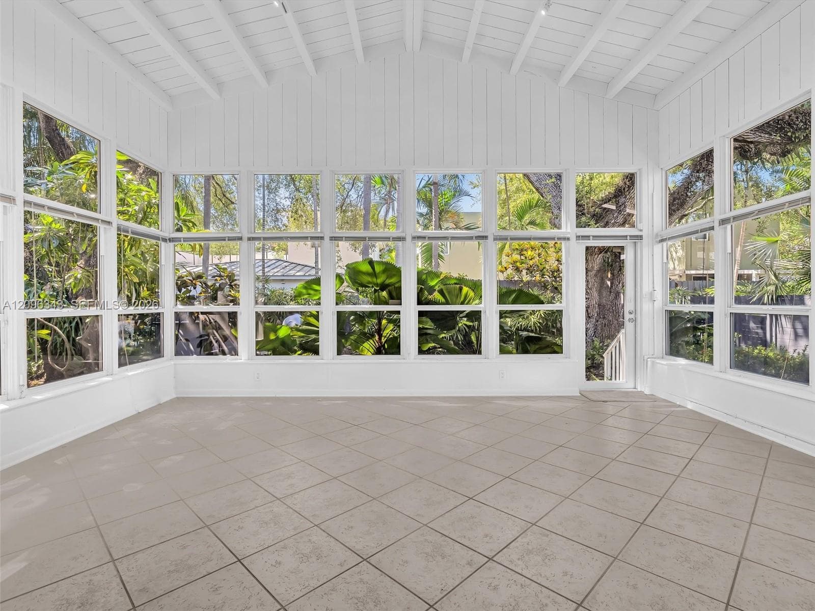 Sunny and private florida room surrounded by nature. Great home for rent in Coconut Grove in Miami, FL. Enjoy large fenced yard, updated home in the North Grove.  Natoma Manors has 24/7 police patrol.   House for rent in Coconut Grove. Home for rent by Realtor. https://www.natomamanors.com/