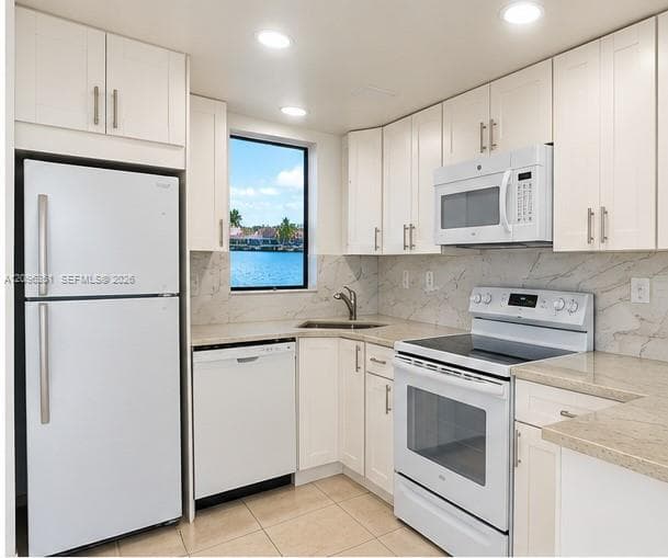 VISTA ALEGRE TOWNHOMES CO · #102 in Hialeah - Photo 2