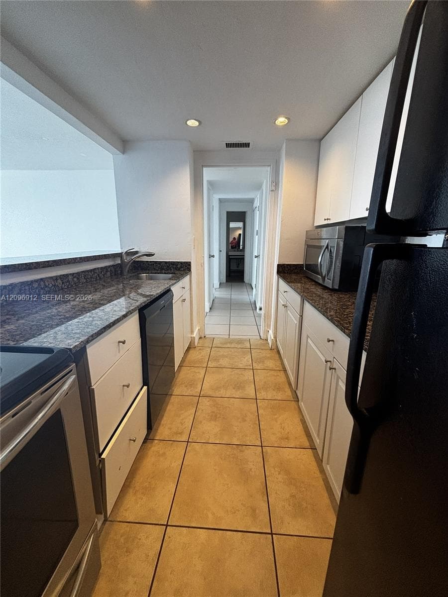 CARIBBEAN TOWERS CONDO · #8F in North Bay Village - Photo 12