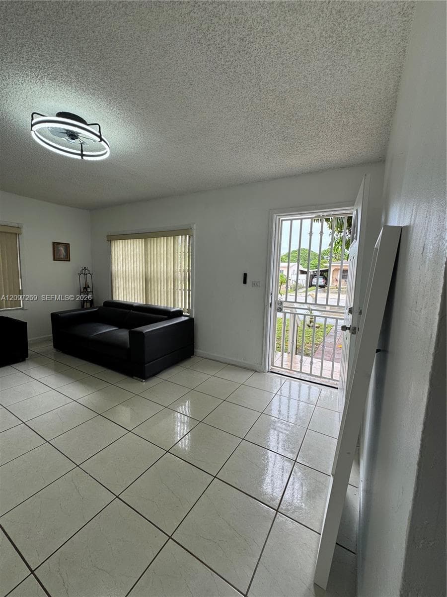 Front door with spacious area.