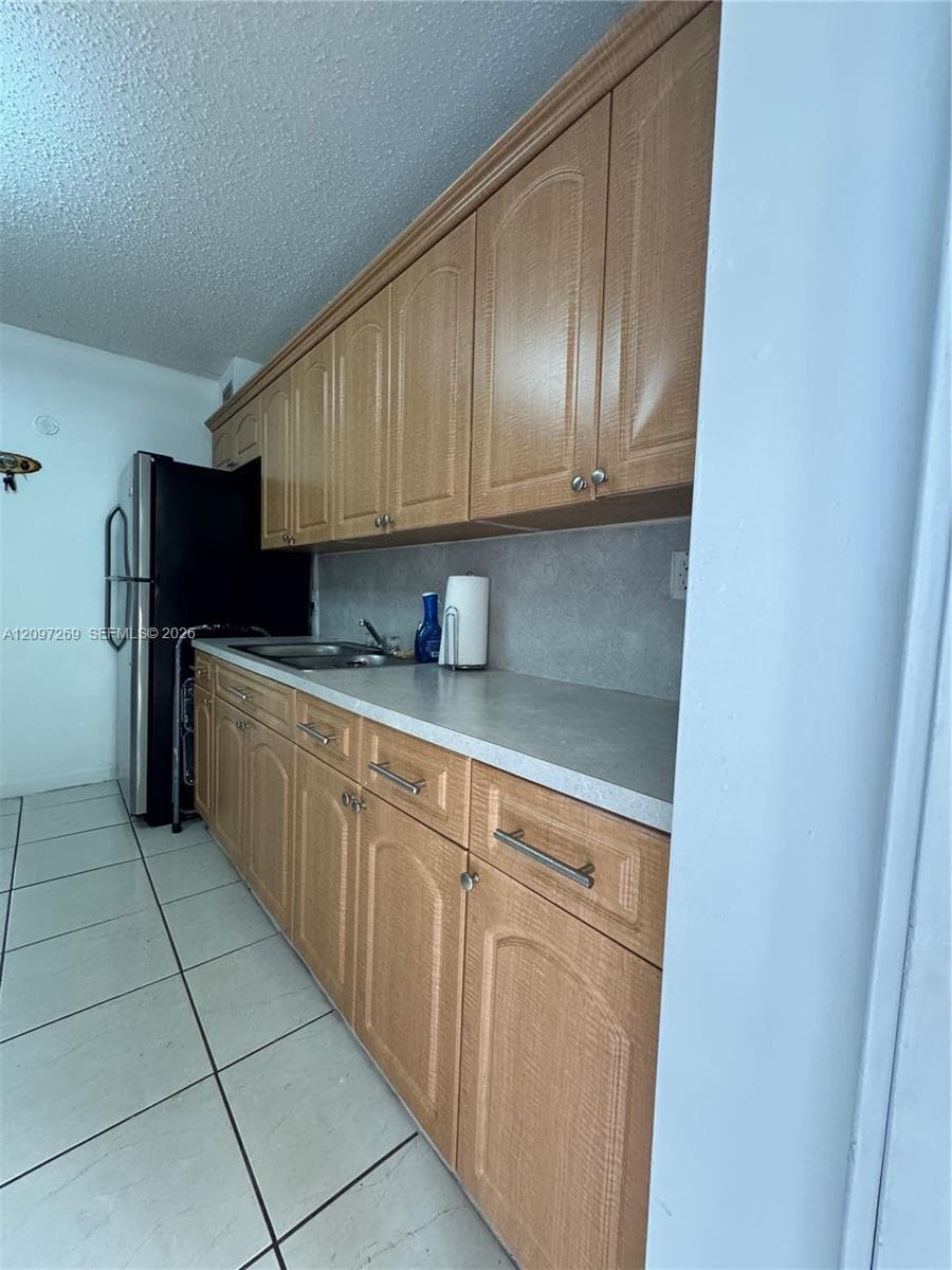 Backdoor with direct access to backyard.