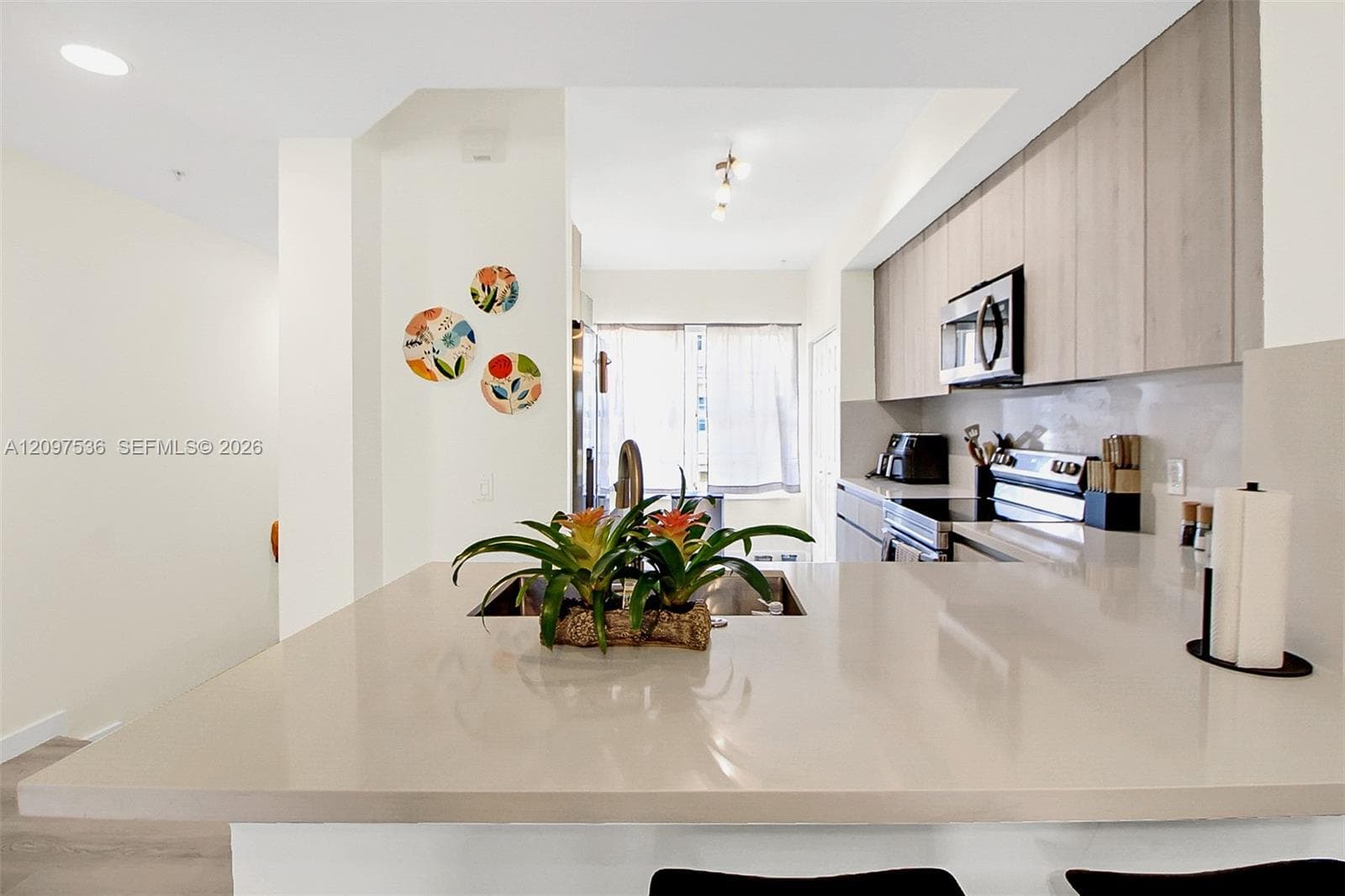 Open counter connect everyone to living and dining areas