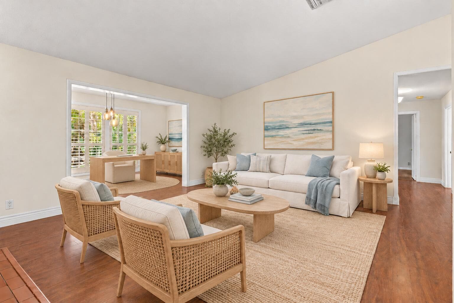 Bright Living Rm opens to Den
