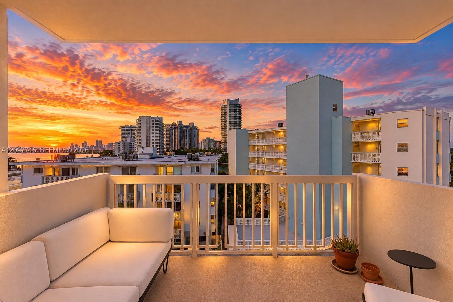 Large private balcony is your new hang out spot watching cruise ships + sunsets