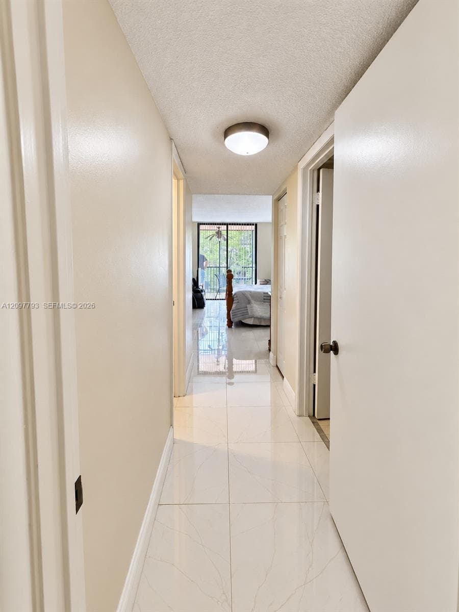 To bedroom, closet left&bathroom right