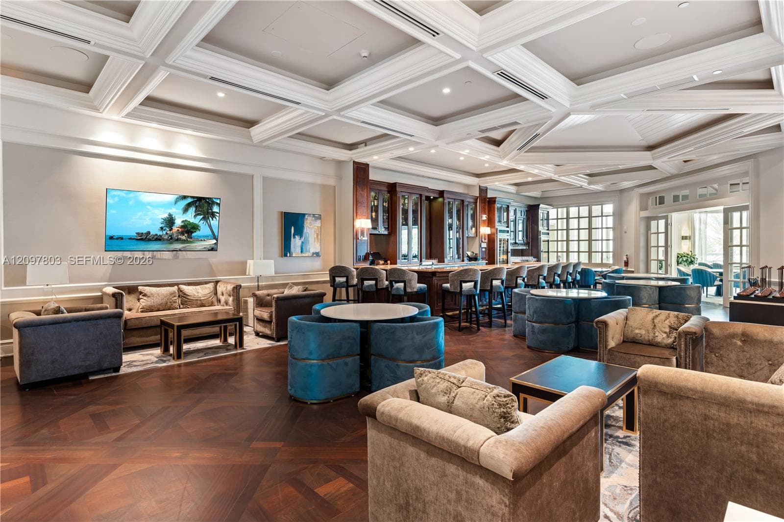 Coffered ceiling with recessed lighting, custom built-in bar, and patterned wood-finish flooring