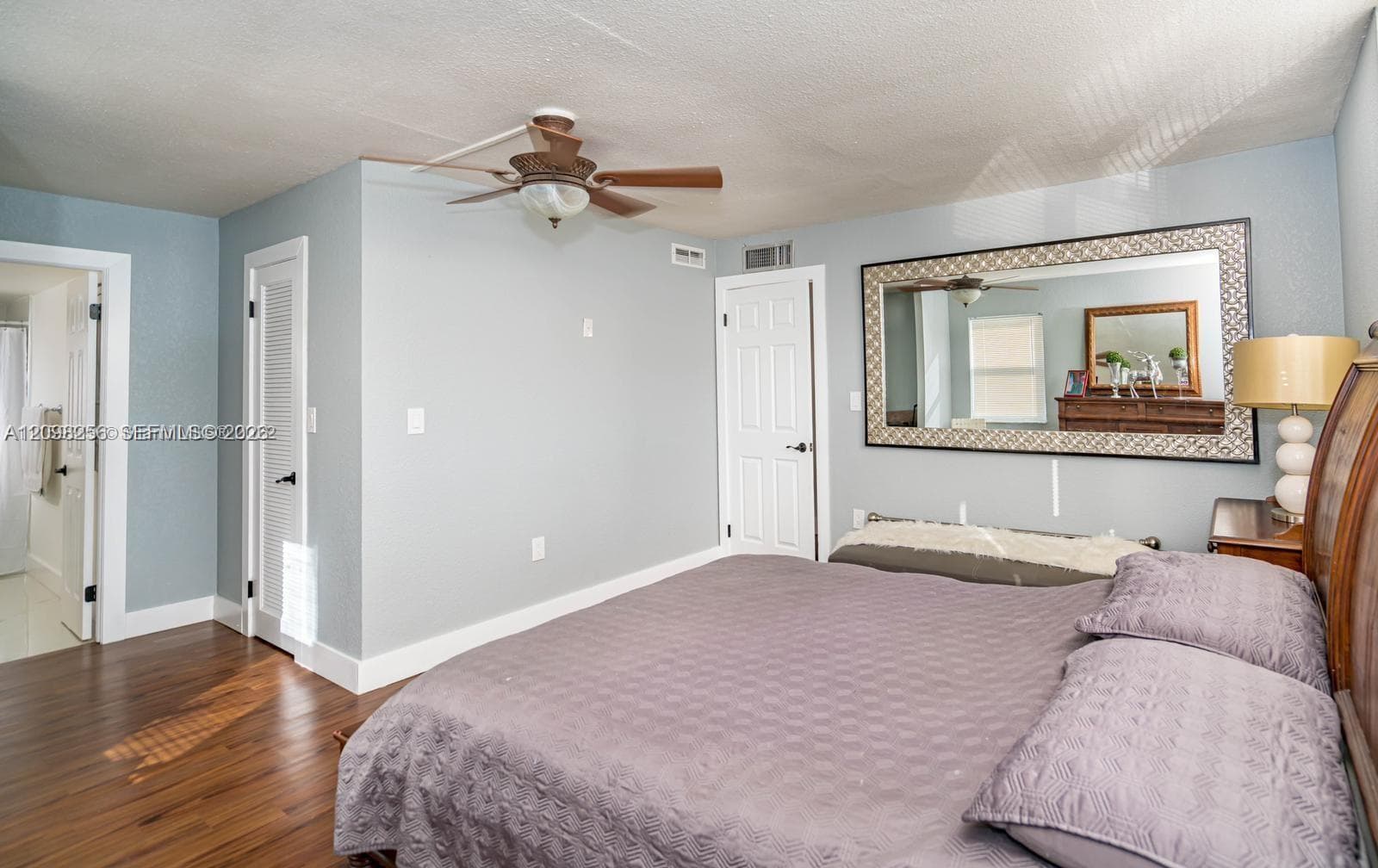 Primary, virtually staged. This furniture is not included.