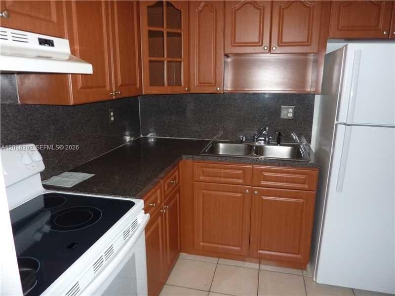 SUNSET PALMS EAST CONDO · #X26 in Miami - Photo 9