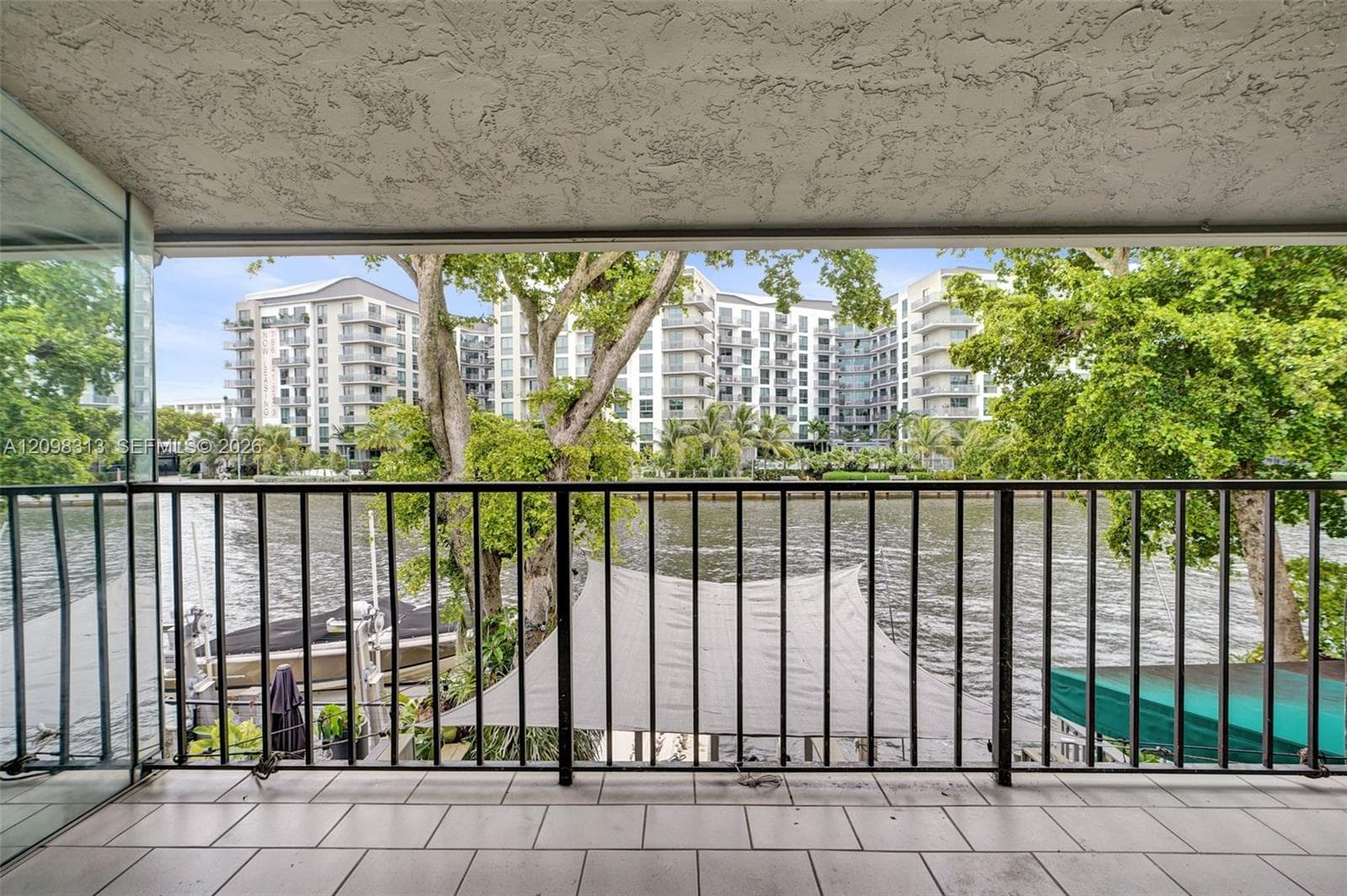 Primary bedroom balcony faces the river