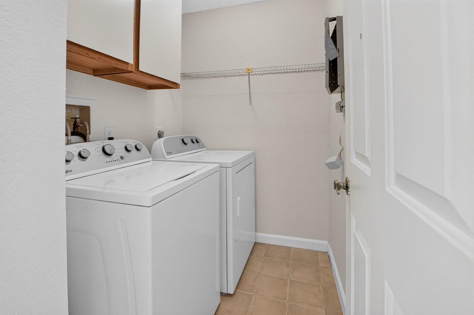LAUNDRY ROOM WITH EXTRA STORAGE