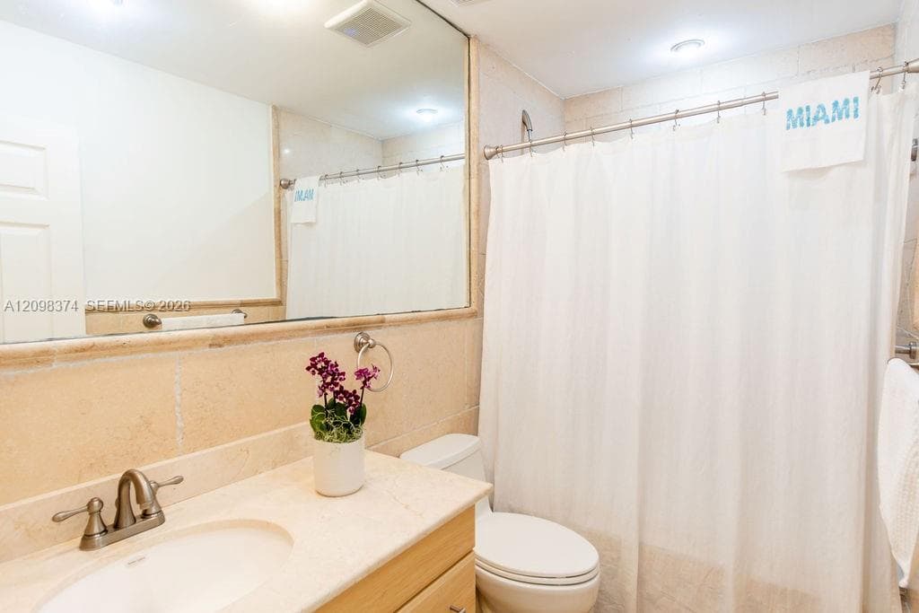 Bathroom # 2 with jacuzzi-shower combination.