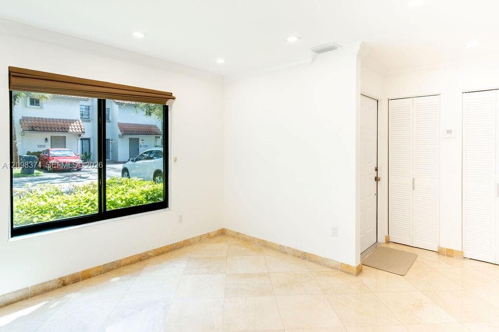 AC closet and coat/convenience closet by the entrance door