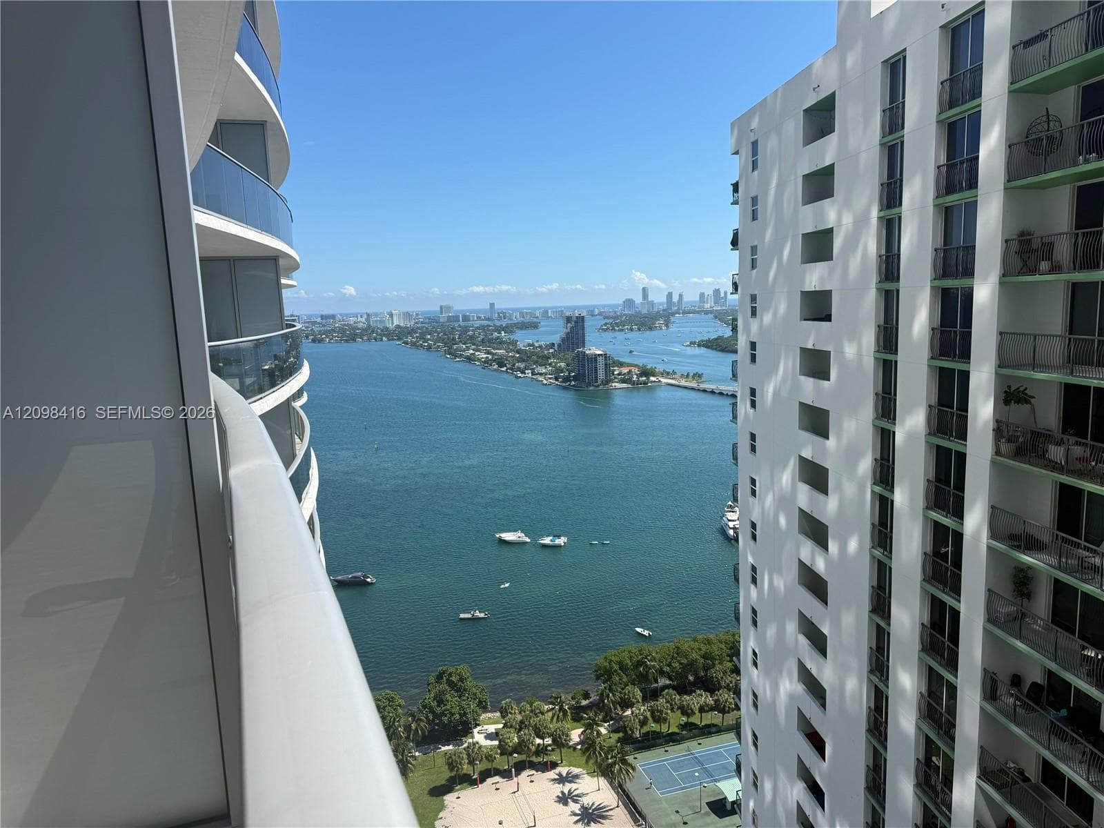 Expansive water scenery with distant city skyline