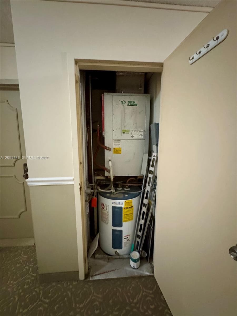 Next door storage for a/c unit and water heater, exterior A/C placement for quiet comfort.
