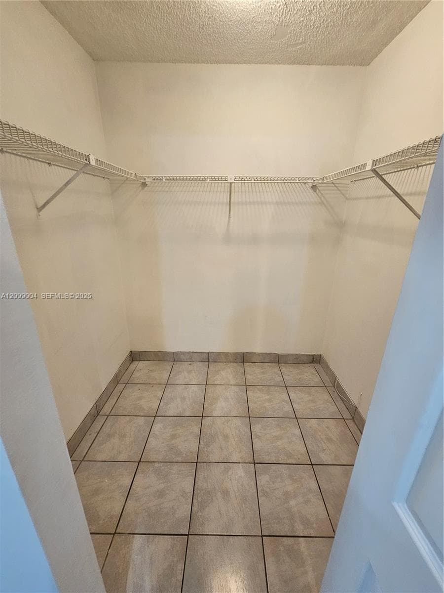 PRIMARY WALK-IN CLOSET
