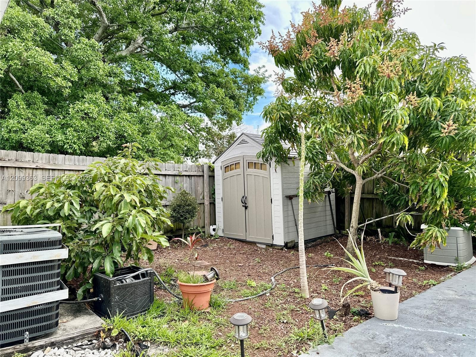 With Storage Shed
