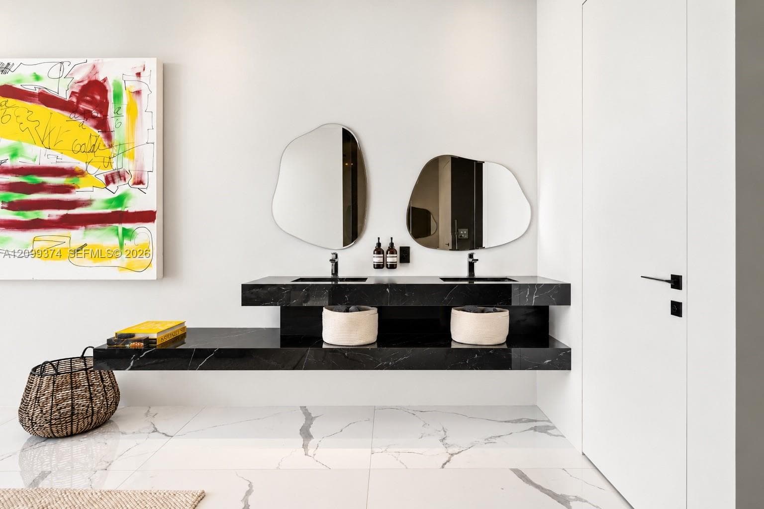 Custom vanity with refined stone and architectural finishes