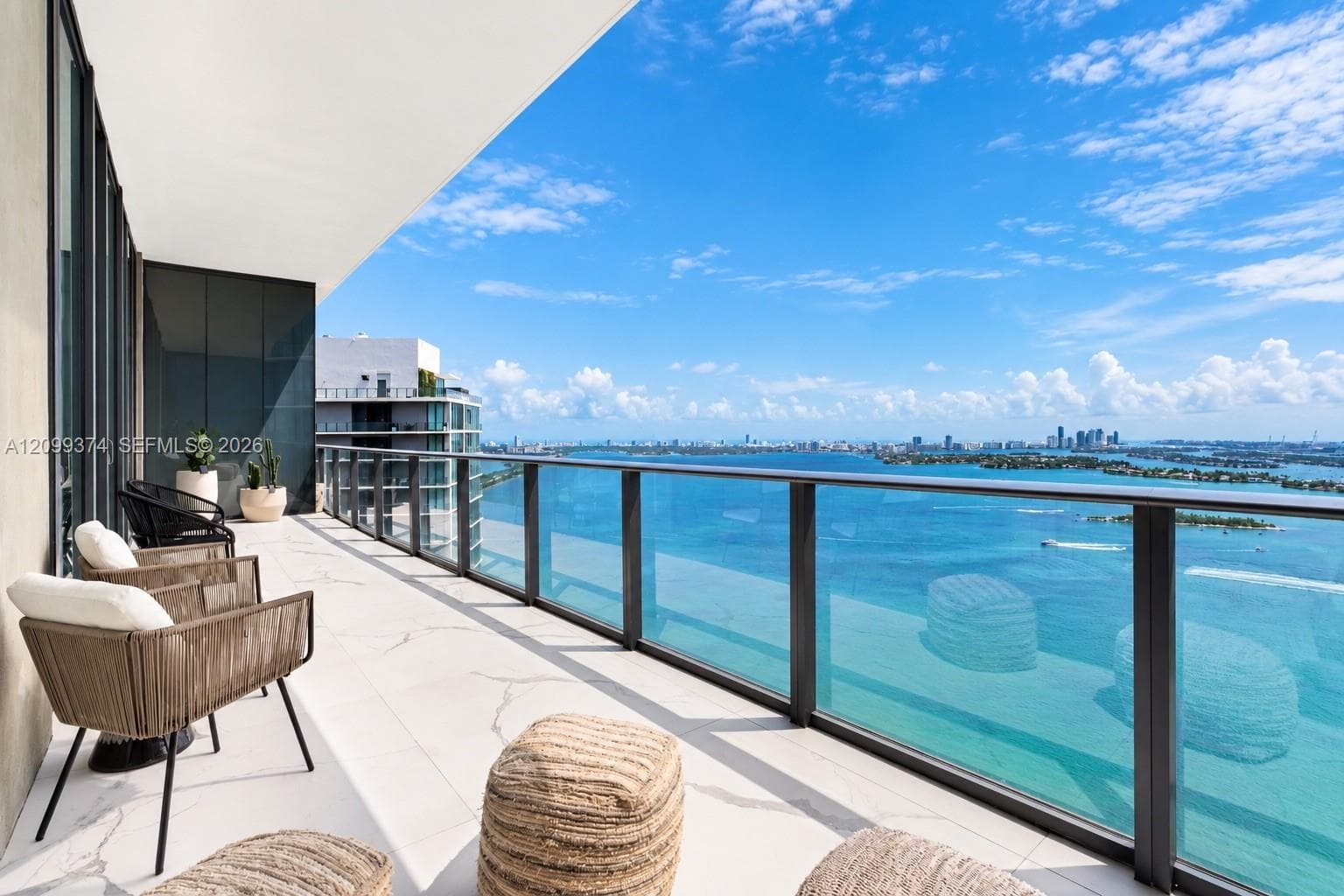 Wide private balcony overlooking Biscayne Bay