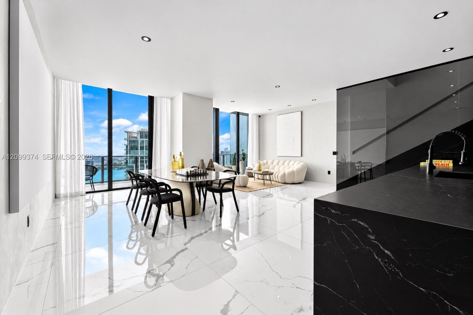 Dining and kitchen area framed by panoramic views