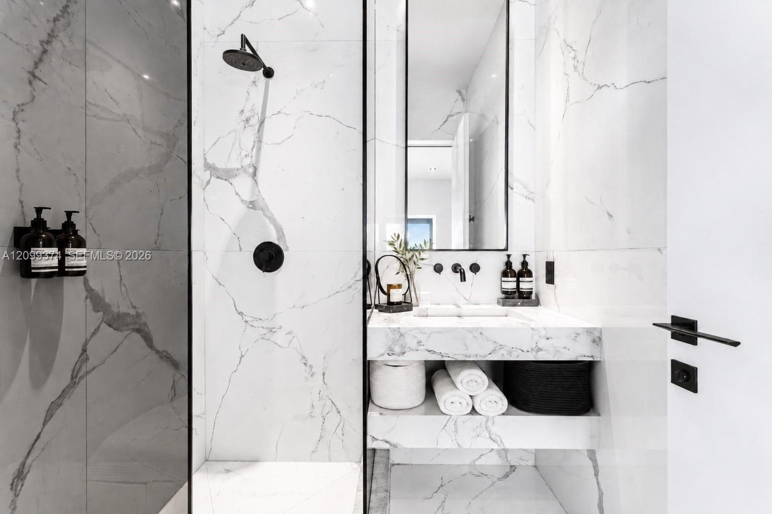Modern bathroom with glass shower and custom vanity