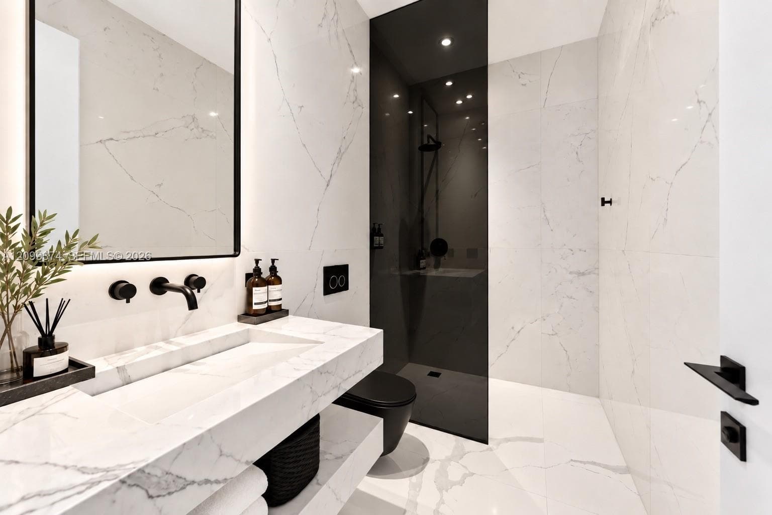 Spa-inspired bathroom with custom vanity and glass shower