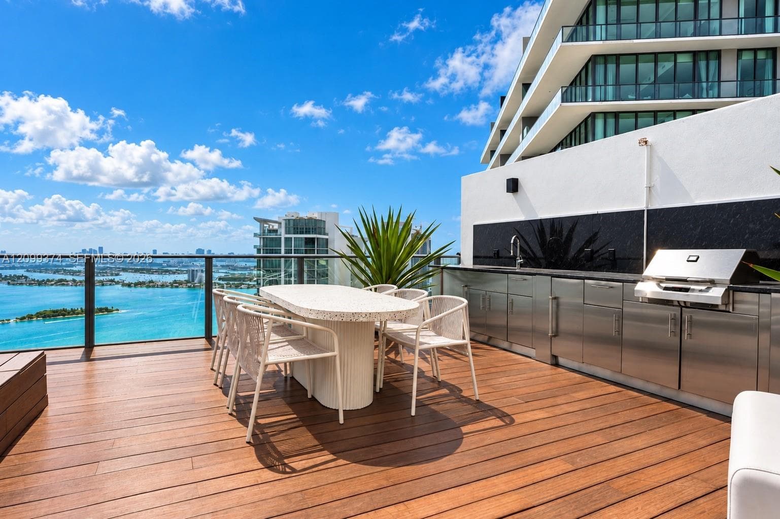 Outdoor dining and entertaining area with bay views