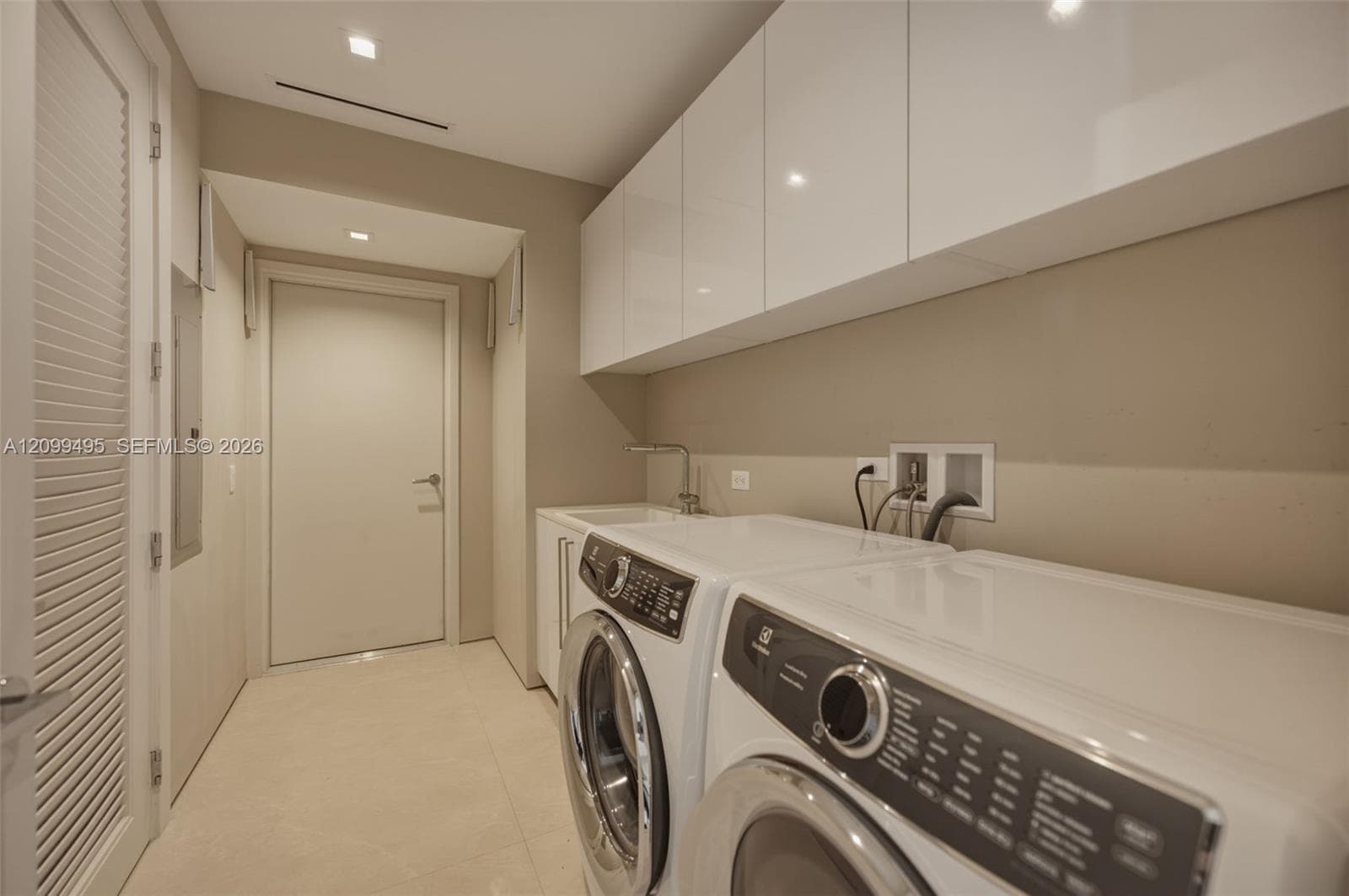 Large laundry with private entrance.