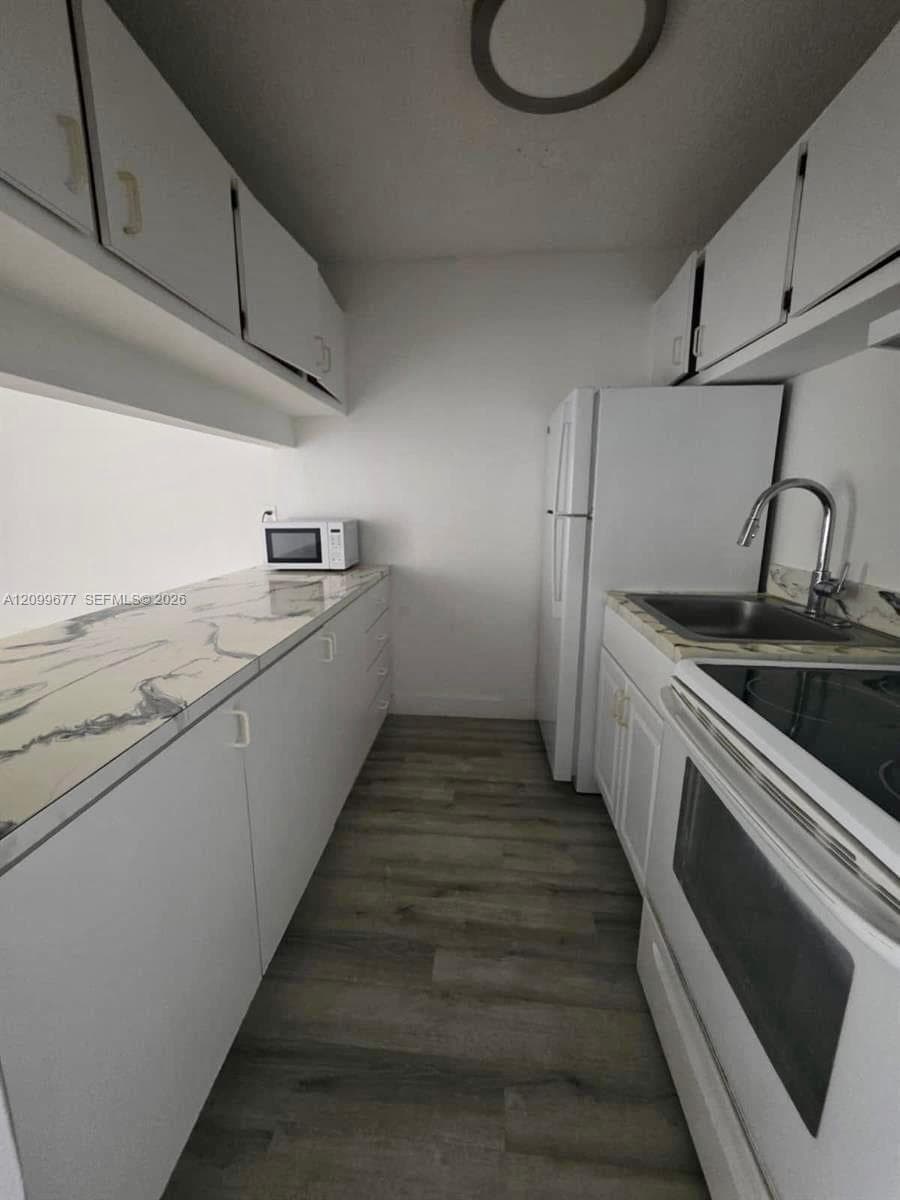 NEW WORLD CONDO APTS III · #A-103 in Miami Gardens - Photo 2