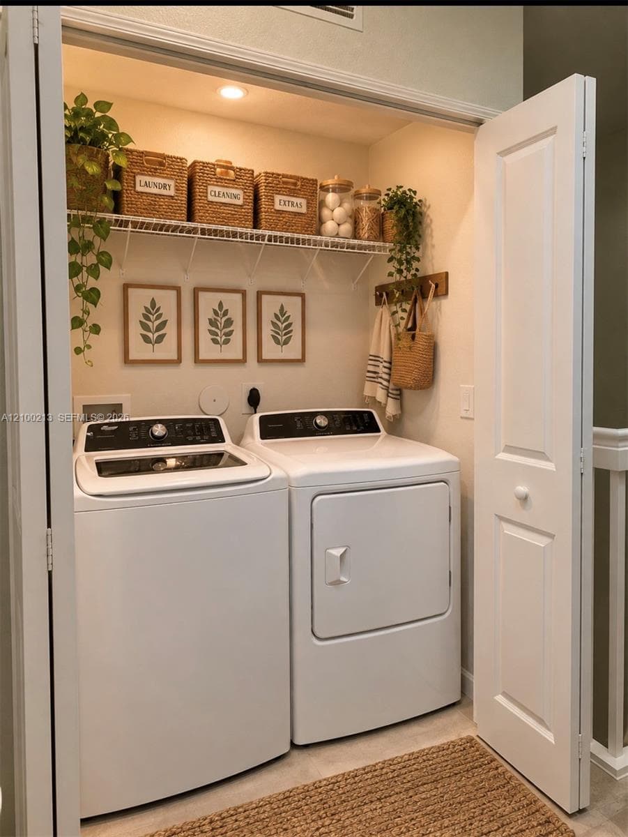 Laundry alcove featuring white bi-fold doors, recessed lighting, and a metal wire shelving unit