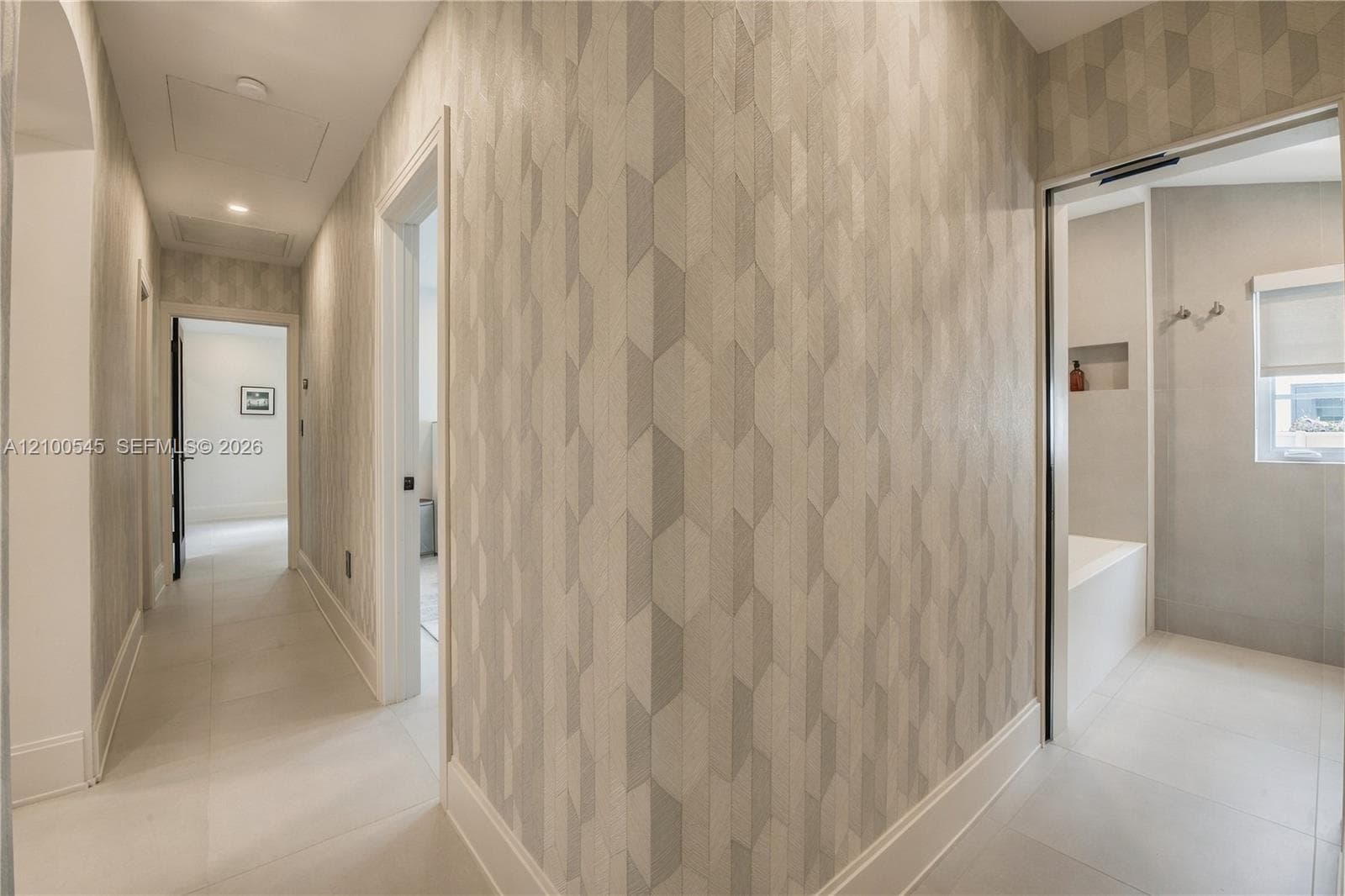 Wallpapered Hallway for separate sleeping wing of residence.