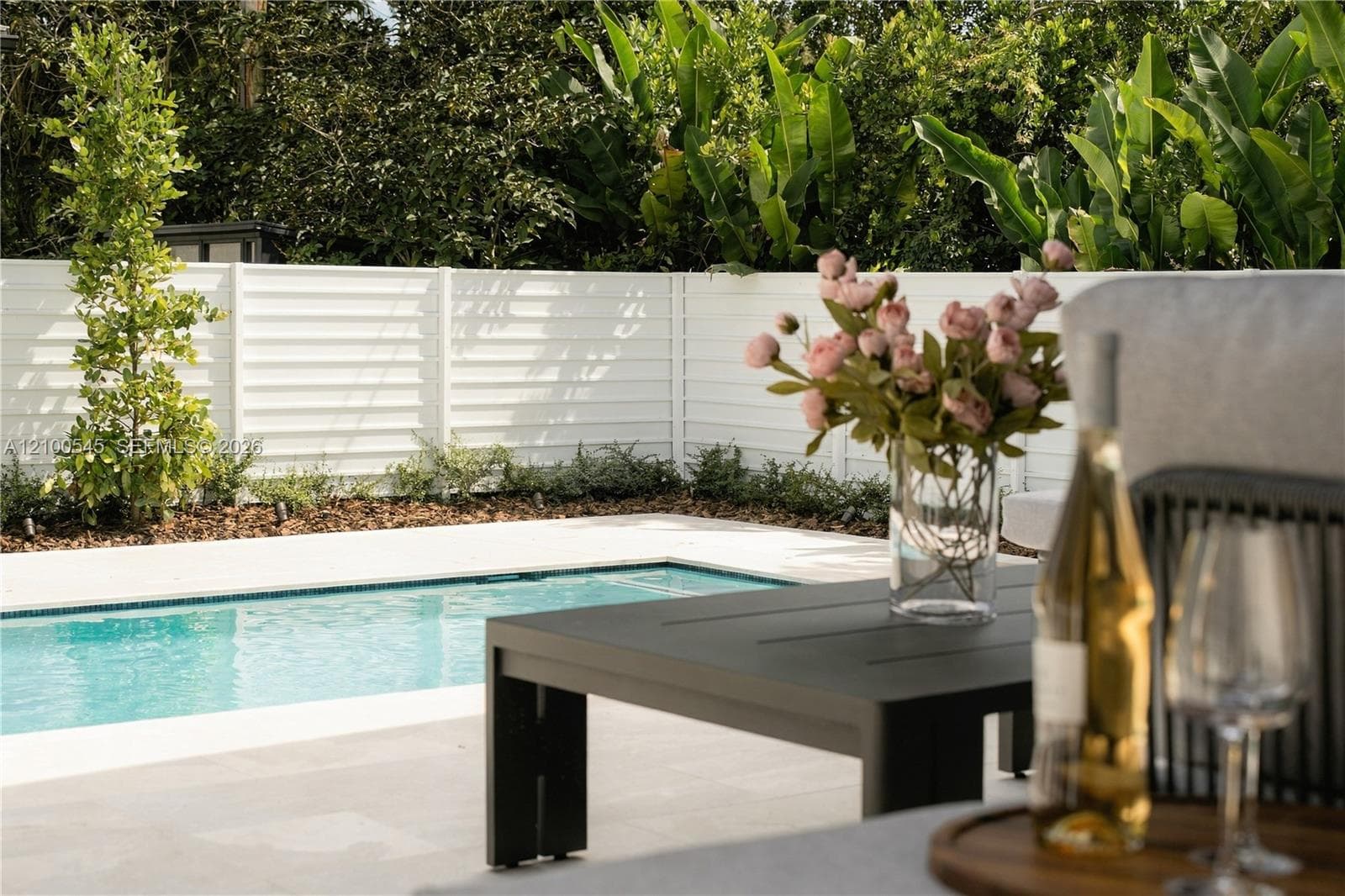 Serene backyard with new pool.