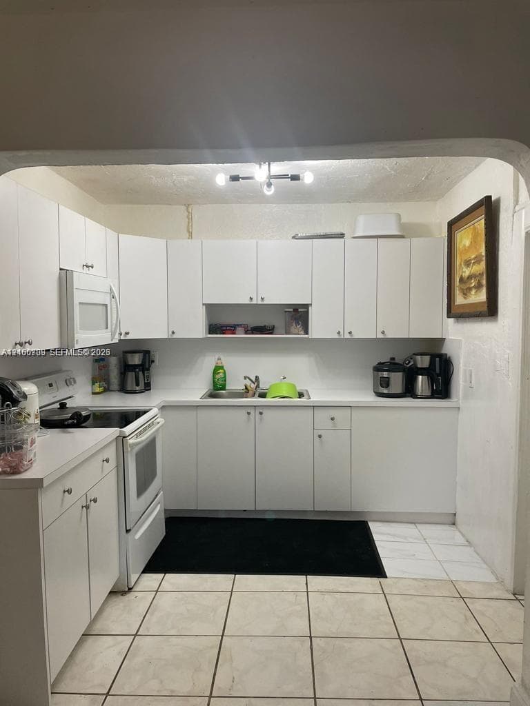 1137 NW 58th Ter photo 2