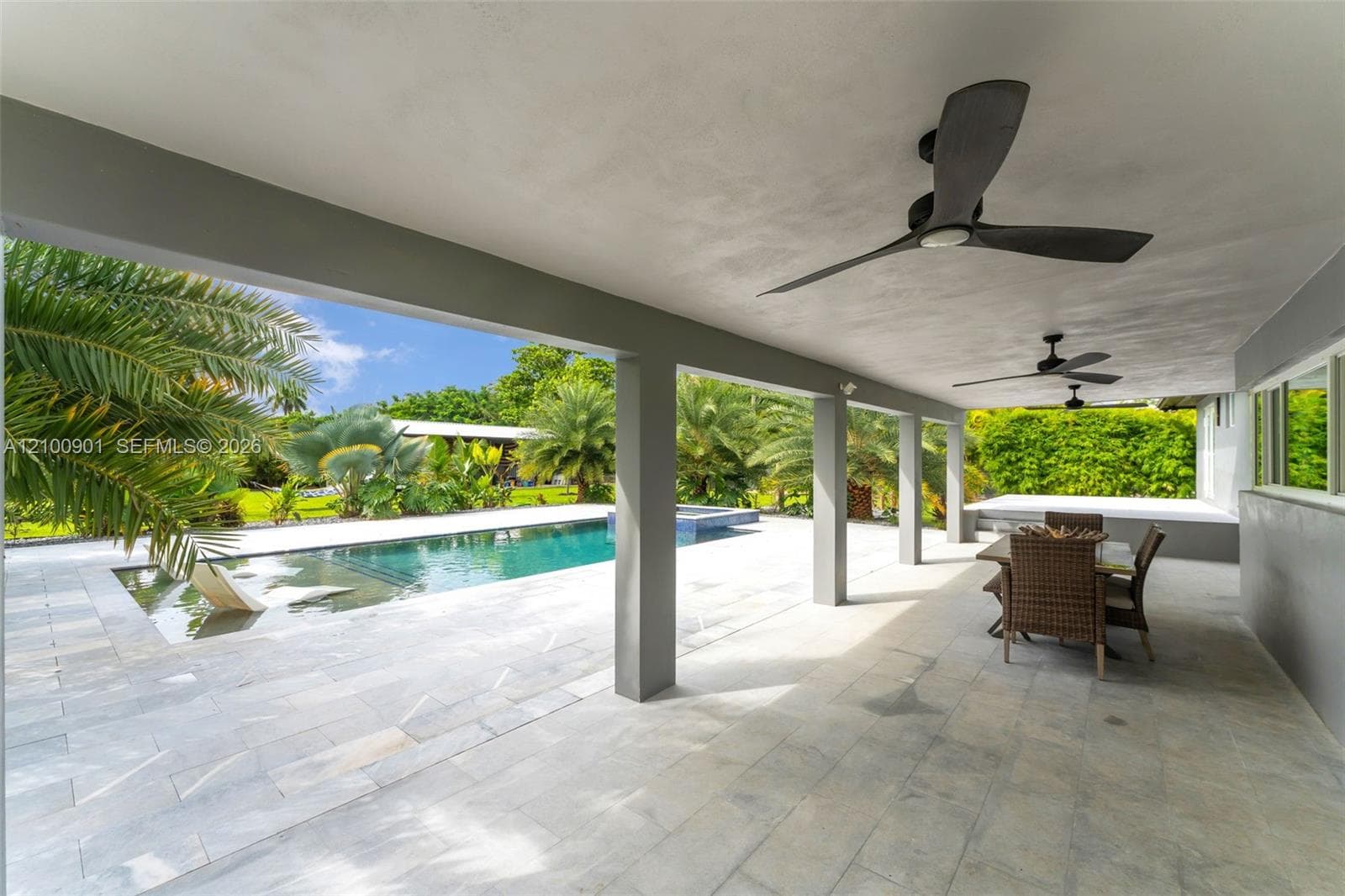 RESORT LEVEL!!!  SMART SALT WATER POOL SYSTEM THATS HEATED.IDEAL FOR THOSE OF US THAT COLOR!..WITH WATERFALL FEATURE, HOT TUB, TANING LEDGE WITH LOUNGERS.THIS IS A BEAUTY.