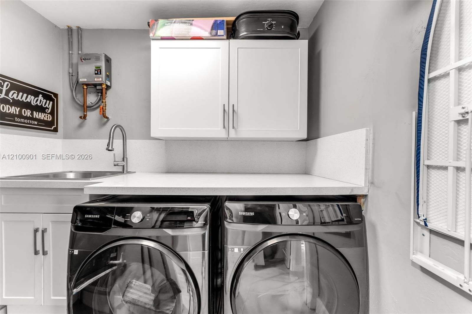 INSTA HOT, BUILT IN IRONING BOARD AND SINK...