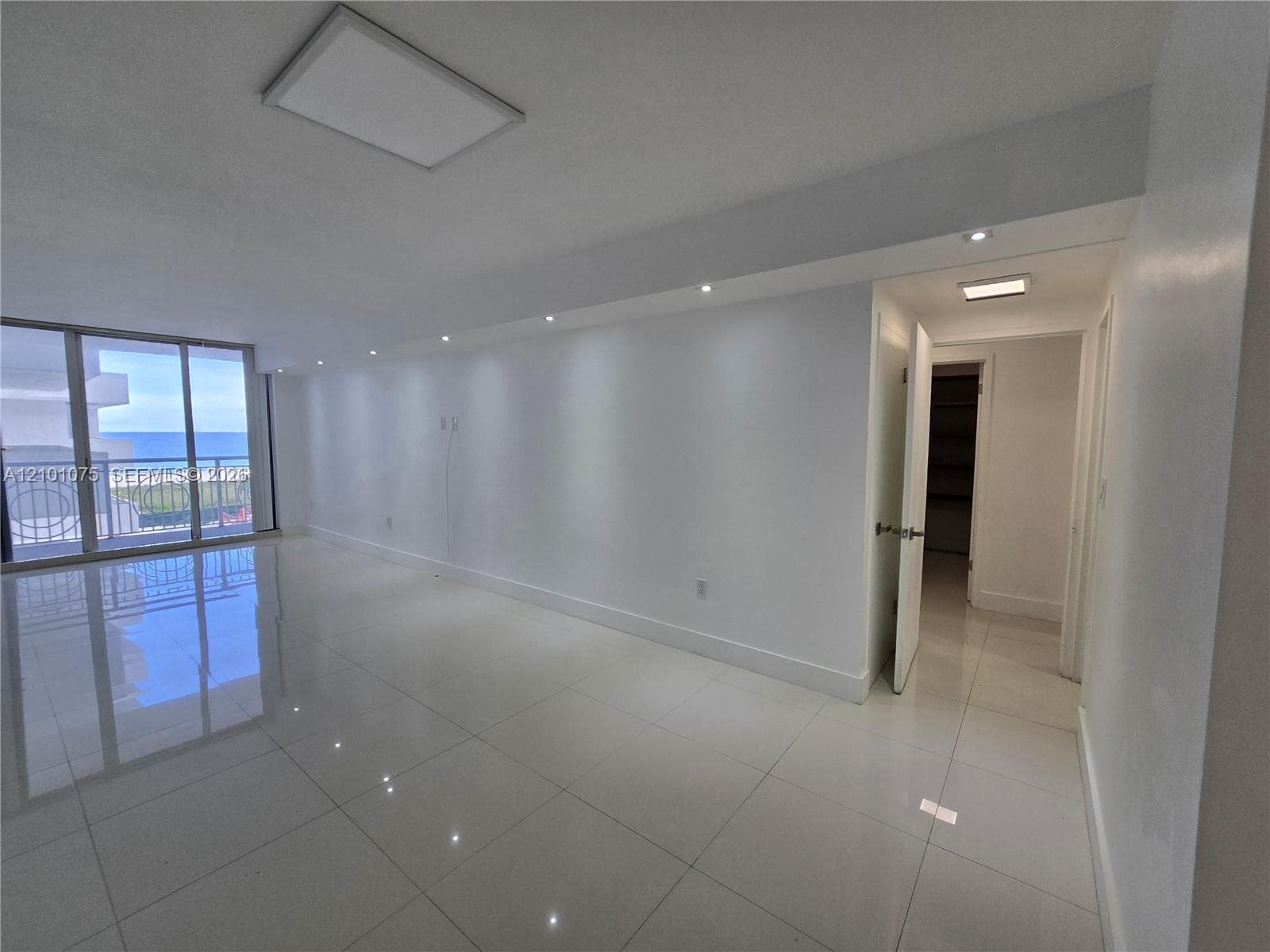 Living and entrance to primary bedroom