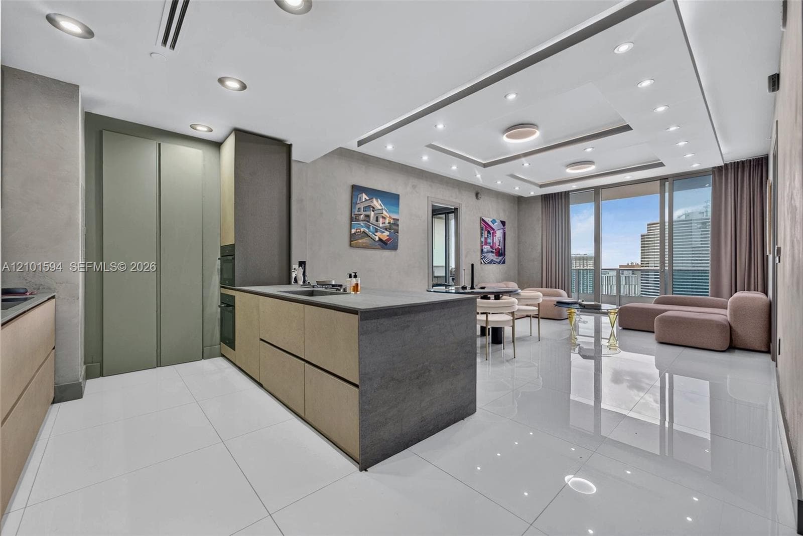 Modulnova kitchen with large island, open to the living area.