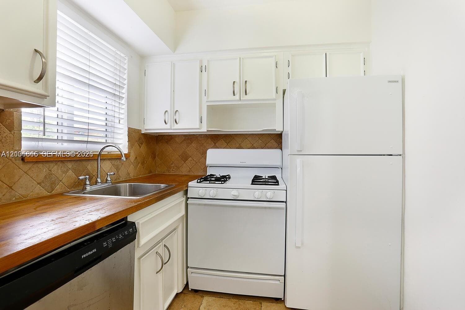 Dishwasher and gas cook top.