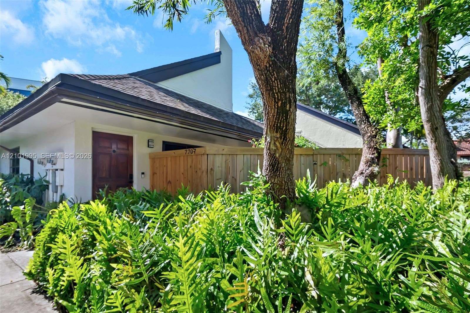 7707 SW 100th St #- photo 1