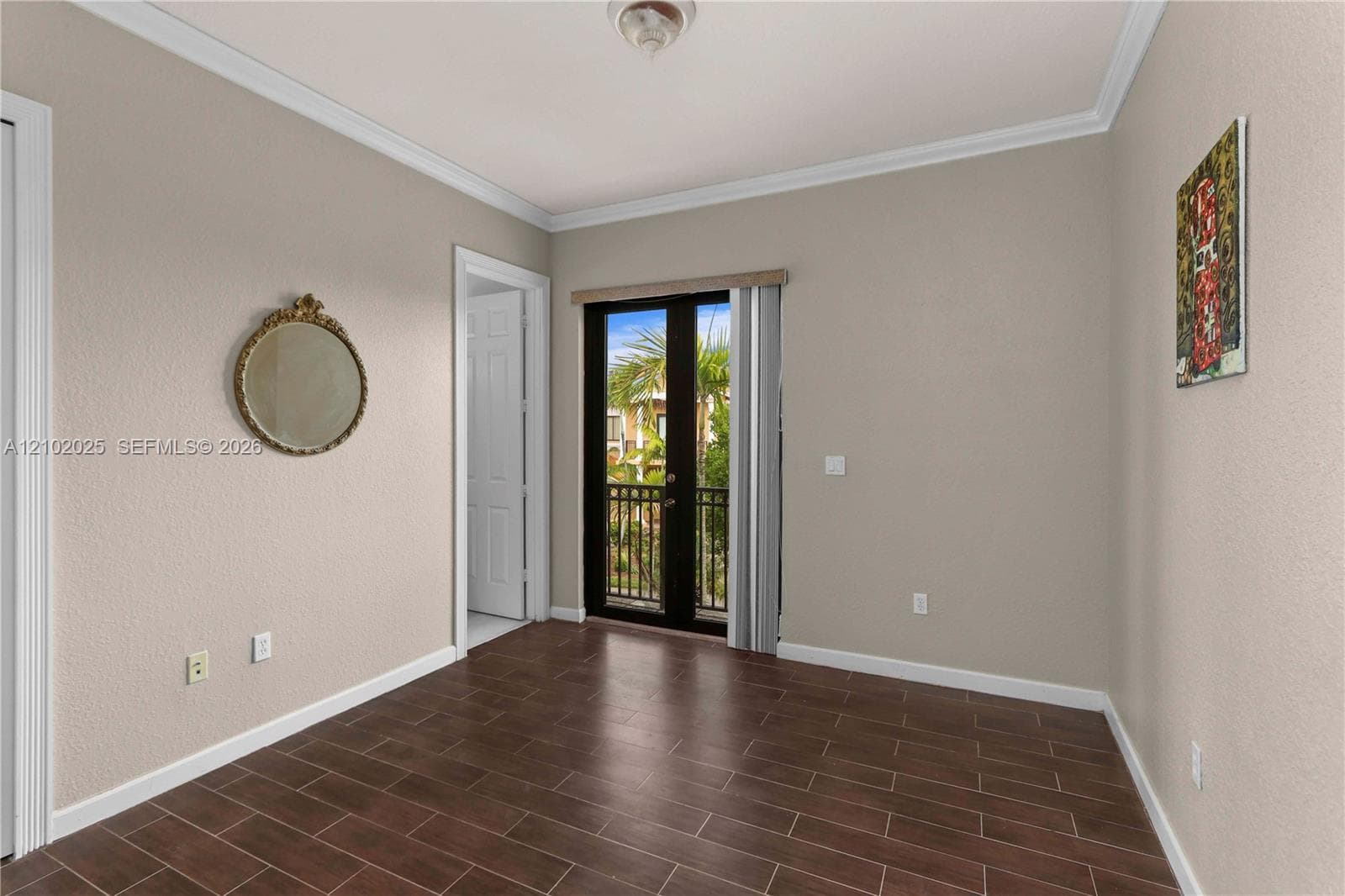 Front bedroom with balcony